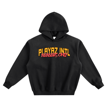 Black oversized streetwear hoodie with bold yellow Stay Down Until You Come Up PLAYAZ INTL graphic on the back