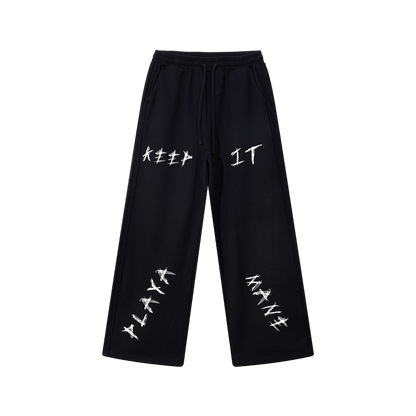 Black pants with white text on a white background