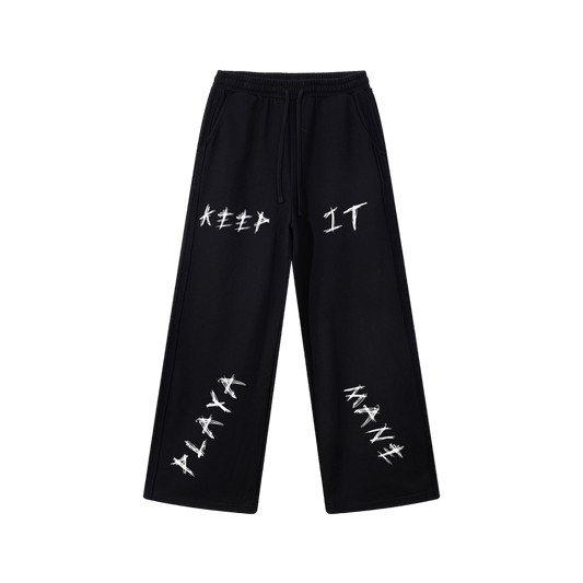 Black pants with white text on a white background