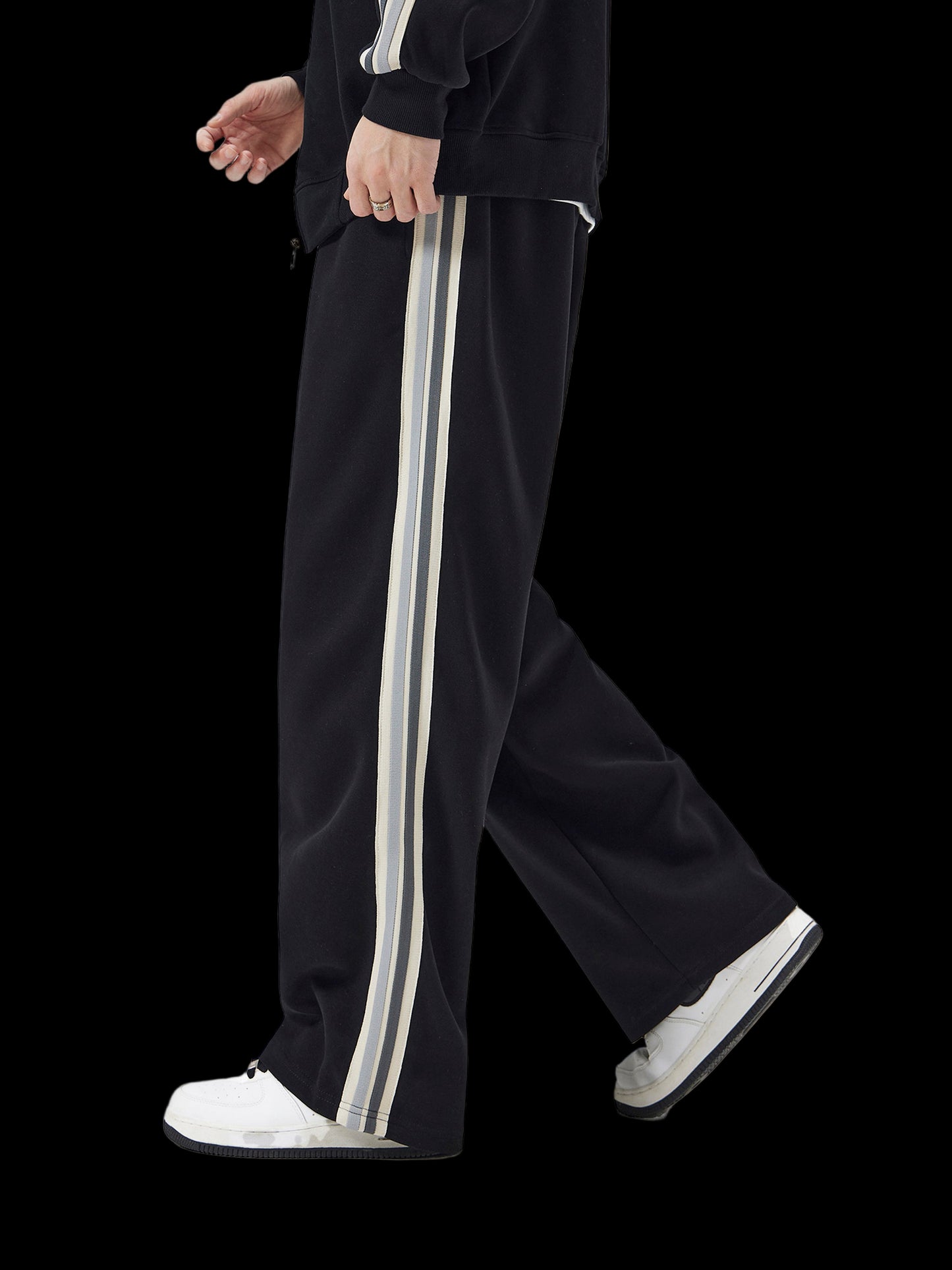 black track pants with white stripes